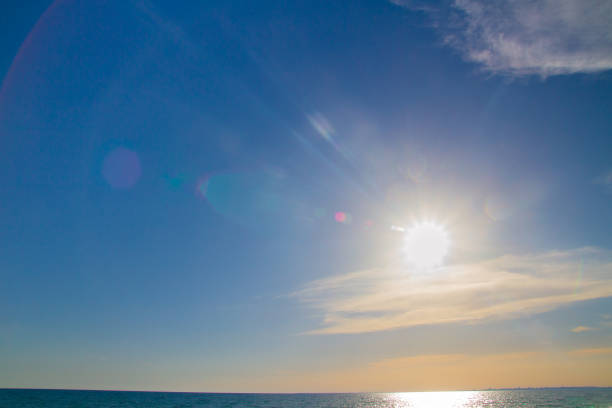istock Beautiful summer sunset with clouds over the sea 1025598046