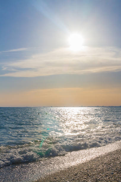 Beautiful summer sunset with clouds over the sea