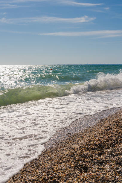 istock Beach with a wave in the summer Sunny day 1025605896