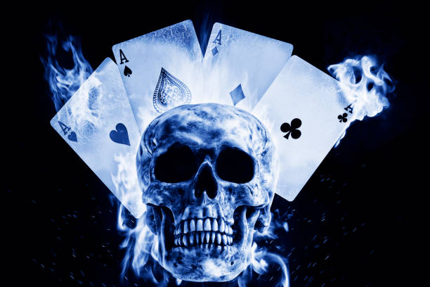 Skull and playing cards in fire on a black background. Photo manipulation artwork, 3D rendering.