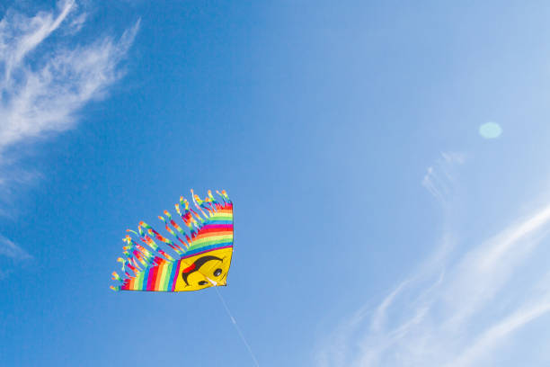 istock A fun and bright flying kite in the blue sky 1025606316
