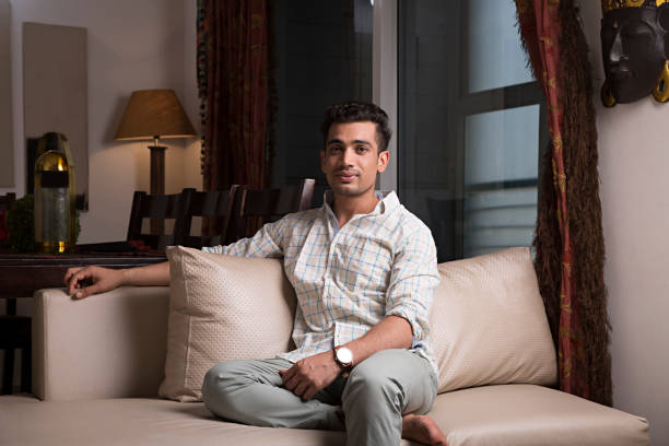 istock Young Asian man working at home. - Stock image 1025612902