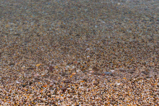 istock Sea stones on the seashore in the summer 1025613810