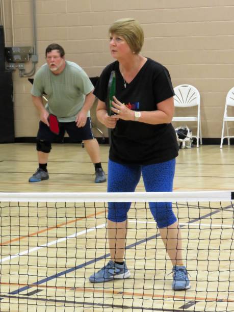 pickleball partners, senior adults pickleball partners, senior adults, inside a gym Christine Kohler stock pictures, royalty-free photos & images