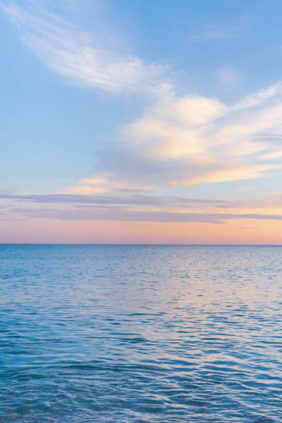 istock Beautiful summer sunset with clouds over the sea 1025614632