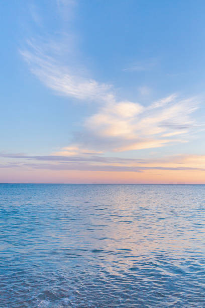 istock Beautiful summer sunset with clouds over the sea 1025614644