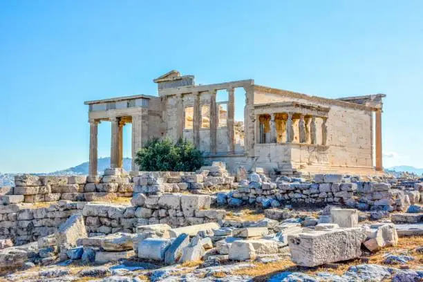 Ancient Erechtheion temple on Acropolis hill in Athens, Greece