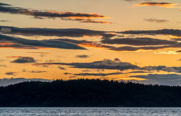 istock Sunset Over McNeil Island 1025627578