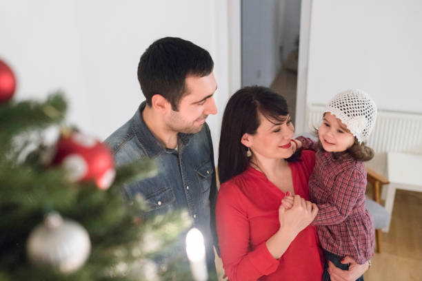 istock Parents in love with their daughter 1025645914
