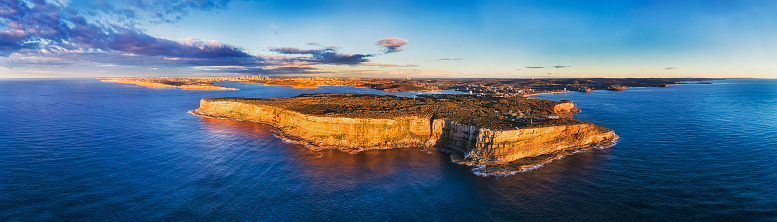 All Sydney coast from Eastern suburbs to Northern beaches in single wide 180 degrees aerial panorama against NOrth Head at the entrance to Sydney Harbour.