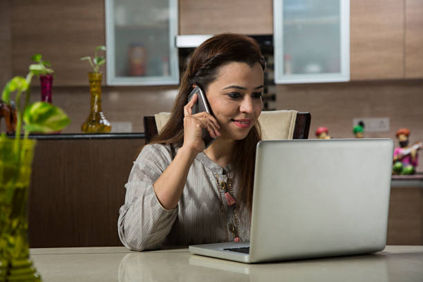 istock Young Woman Working on a computer - Stock image 1025661170