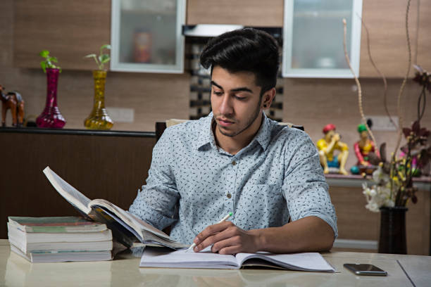istock Adult Indian university student - Stock image 1025672964
