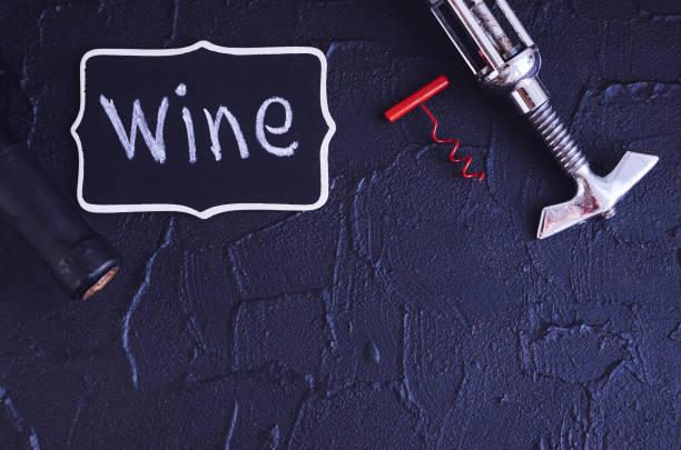 istock Bottle of wine with two corkscrews 1025682458