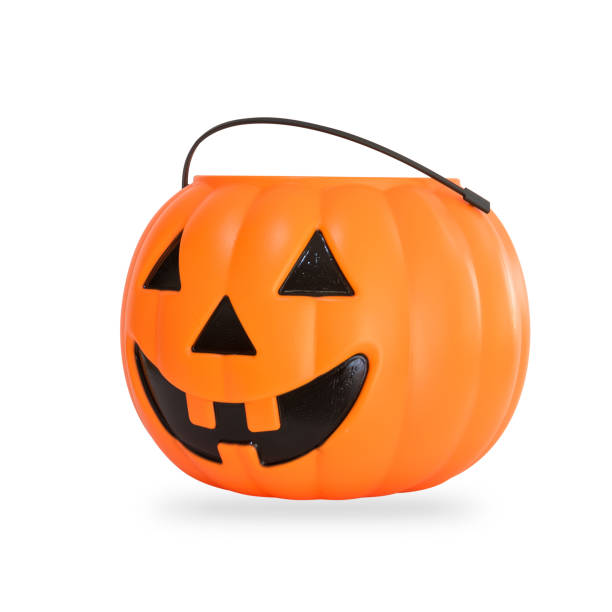 istock Pumpkin basket isolated on white background (clipping path) for kid collecting candy Jack o'lantern basket , trick or treat on Halloween day celebration 1025682570
