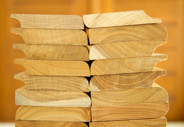 istock Stack of cutted solid teak wood with wooden background 1025692154