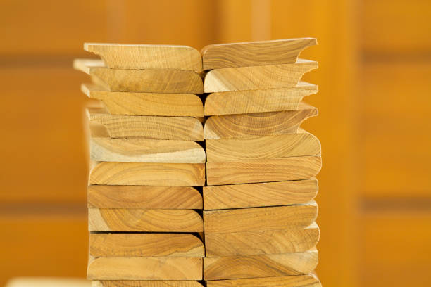 istock Stack of cutted solid teak wood with wooden background 1025692162