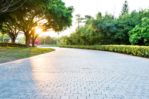 Empty brick road in the park Empty brick road in the park. sidewalk stock pictures, royalty-free photos & images