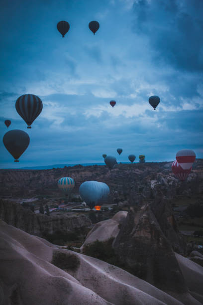 istock Hot air balloons Cappadocia landscape view 1025736578
