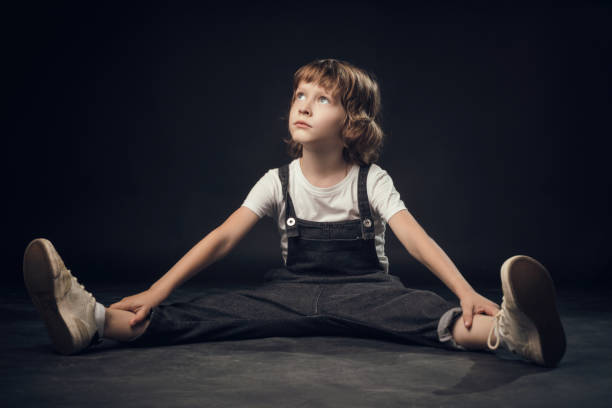 istock child emotionally posing on camera in the Studio on a white background 1025742488