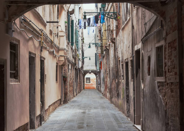istock Empty vintage looking street view from Venice 1025749620