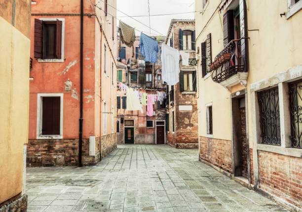 istock Colourful street scene from Venice, Italy 1025749676