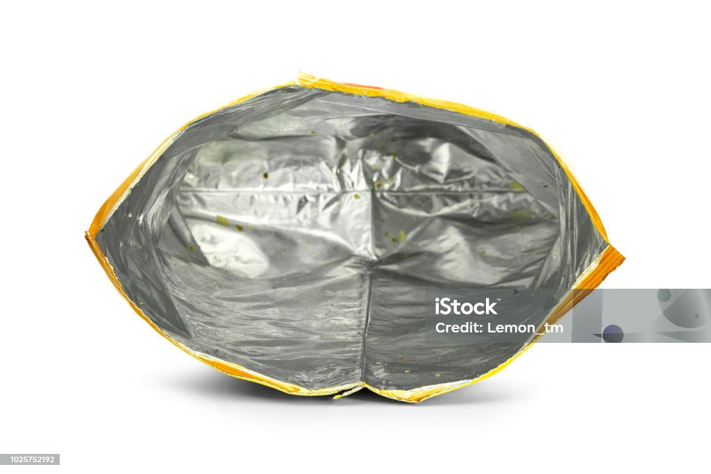 Potato chips bag isolated on white background. Inside of leftovers snack packaging. Bag Stock Photo