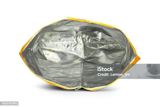 Potato Chips Bag Isolated On White Background Inside Of Leftovers Snack Packaging Stock Photo - Download Image Now