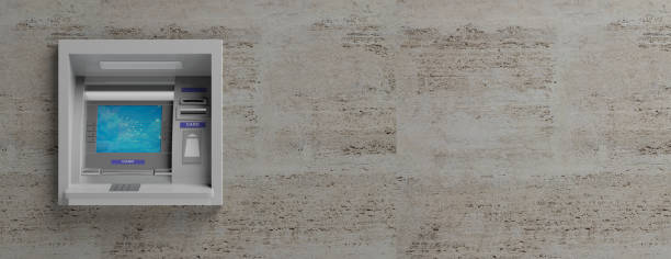 istock ATM machine on stone tiles background. 3d illustration 1025773576