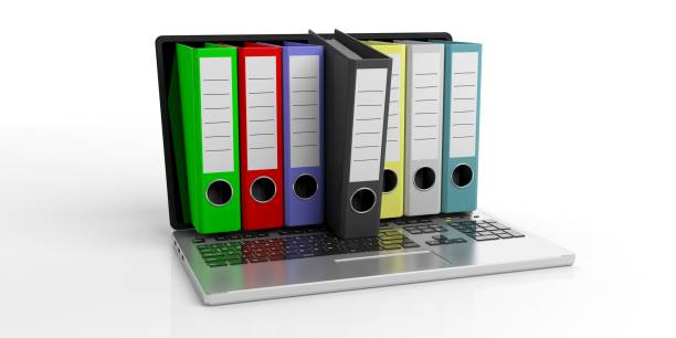 istock Office folders out of a laptop on white background. 3d illustration 1025773744