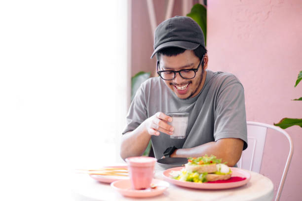 istock man having coffee at cute coffee shop 1025773944
