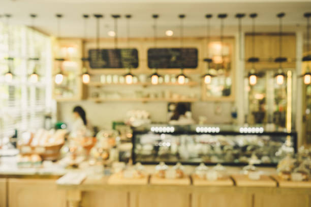 istock Blurred coffee shop background with bokeh light. 1025781146