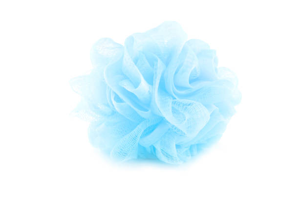 Bath sponge blue isolated on a white background, used for scrub bath, with clipping path. stock photo