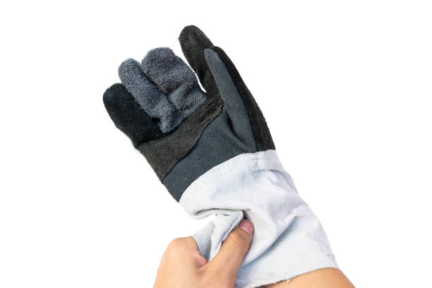 istock man take off the leather work glove isolated on white background 1025787710