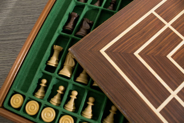 istock Wood complete set of a strategy game with pawns and chess composition 1025815394