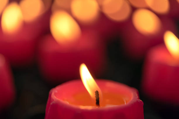 istock Flower candles burning at night. 1025827038