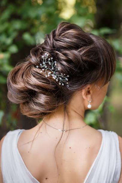 istock Beautiful brunette hairstyle back view 1025827826