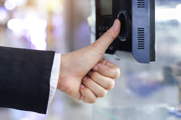 istock Businessman hand scanning finger on machine., Business concept. 1025831396