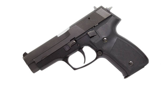 istock 9mm pistol isolated on white background 1025834990