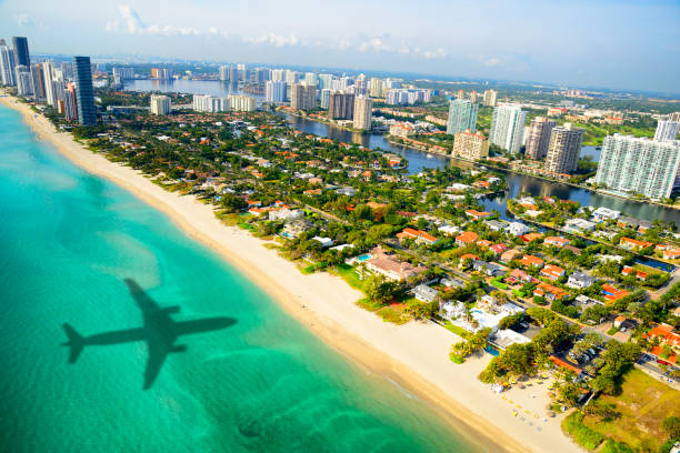 istock Airplane shadow arriving in Miami 1025835302