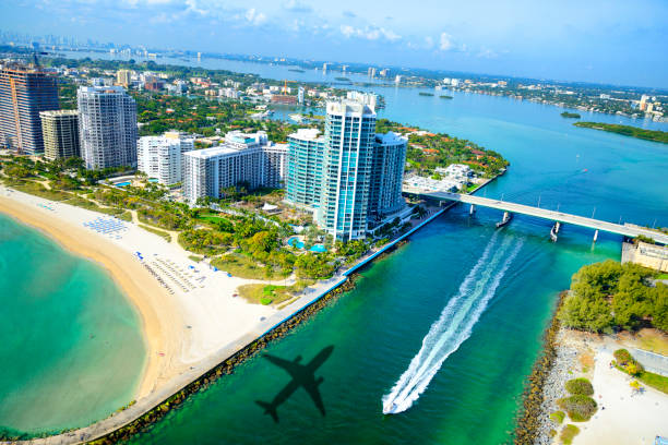 istock Airplane shadow arriving in Miami 1025835356