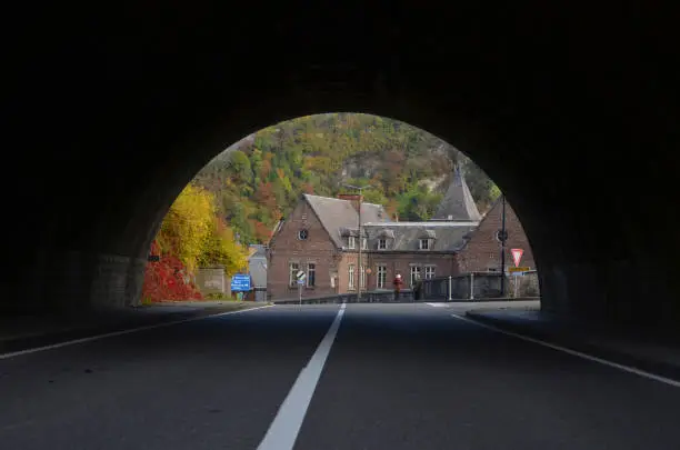 Photo of A tunnel toward the beautiful autumn scene in Dinant.