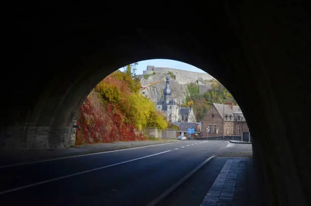 Photo of A tunnel toward the beautiful autumn scene in Dinant.