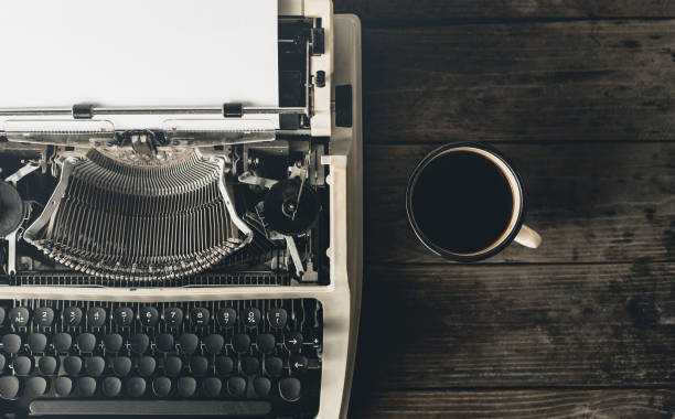 istock Workplace Of A Journalist, Writer Or Blogger, Top View. Creative Studio Author Concept. Digital Tablet, Film Camera And Typewriter 1025847794