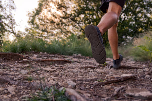 istock man legs running on trail in the mountains 1025855554