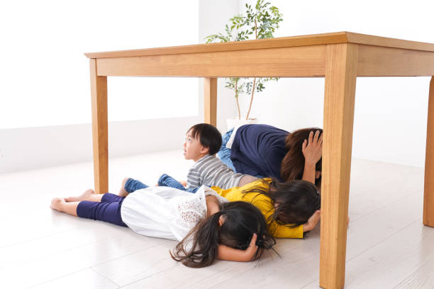 istock Children taking refuge from earthquake 1025864254