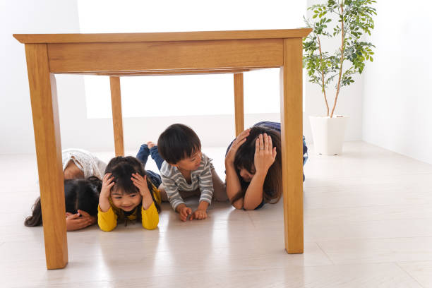 istock Children taking refuge from earthquake 1025864272