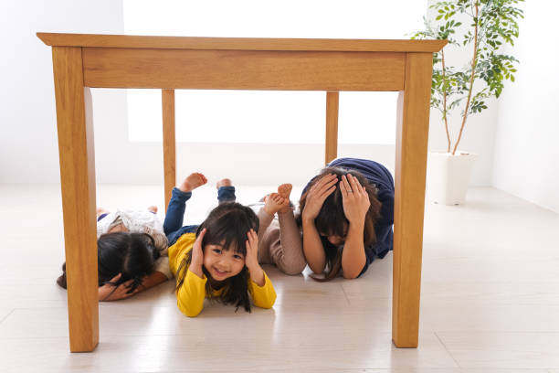istock Children taking refuge from earthquake 1025864278