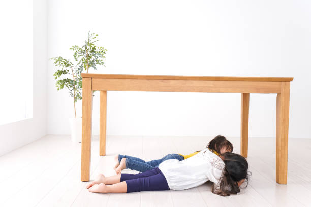istock Children taking refuge from earthquake 1025864284