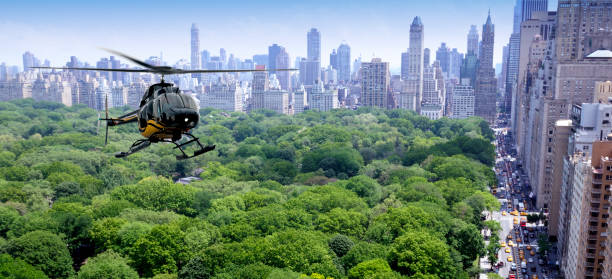 istock Helicopter flying over Central Park, New York City 1025868424