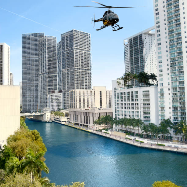 istock Helicopter flying over Miami, Florida, USA 1025873508